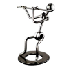 metal flutist figurine